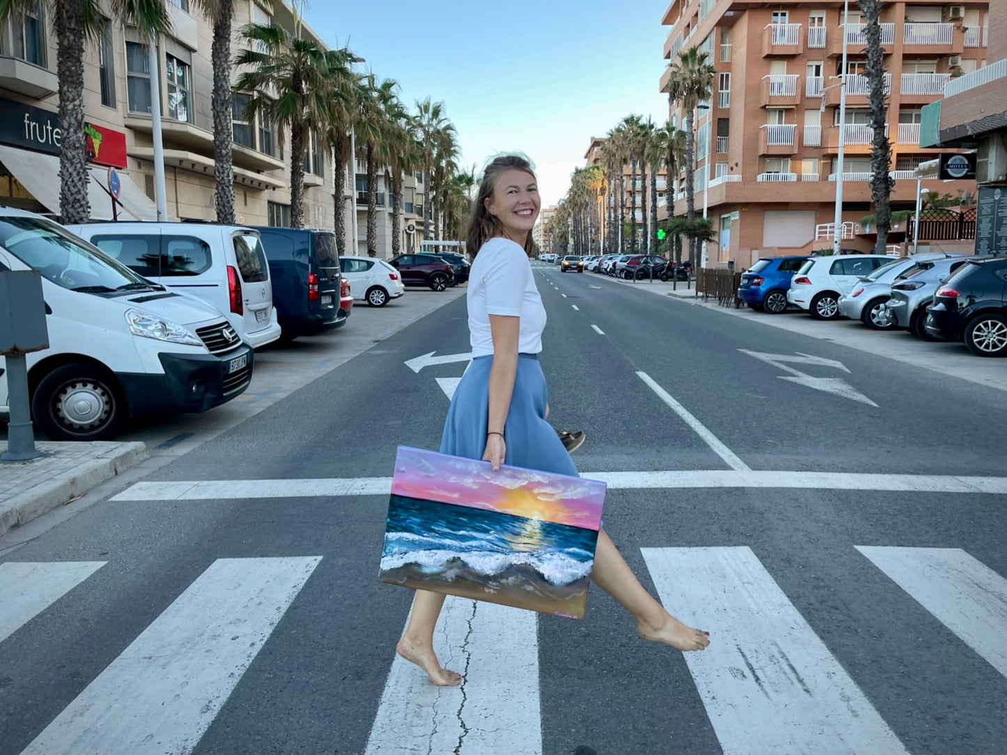 Kassandra with a painting on a crosswalk in Alboraya, Valencia